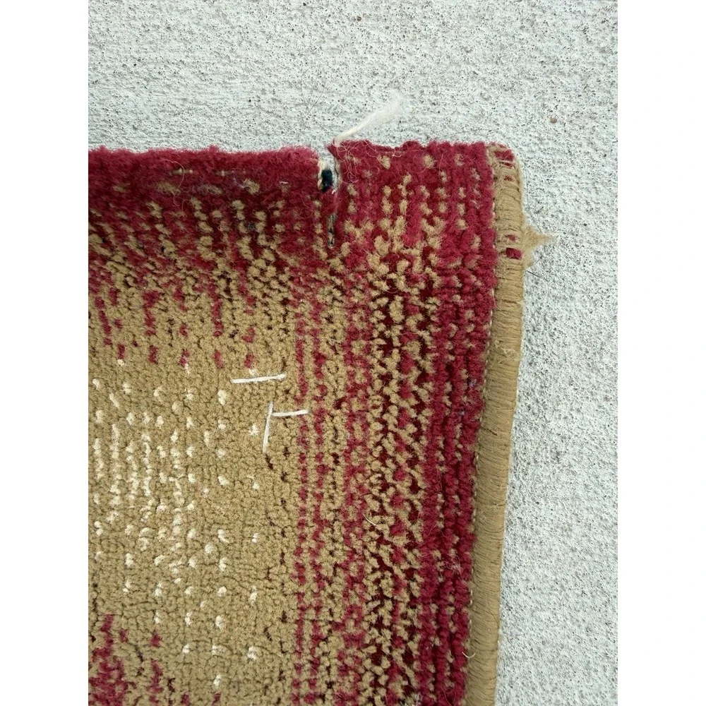 Vintage rug featuring Tom holding Jerry 64x42